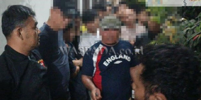 Ilustrasi polisi memediasi keributan di rumah kos Siantar
