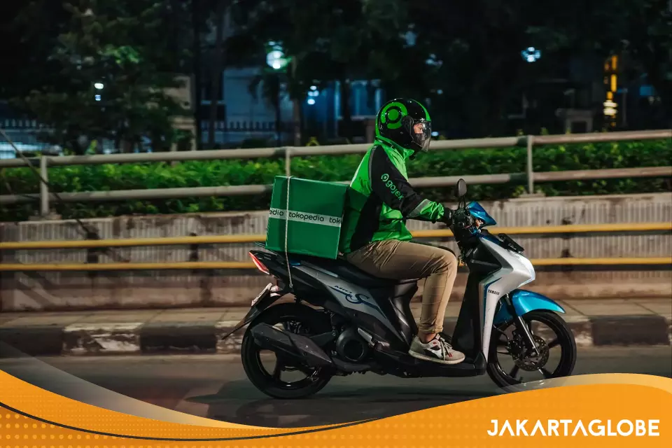 Ilustrasi logo GoTo dan Danantara terkait kepemilikan saham dan kebijakan komisi
