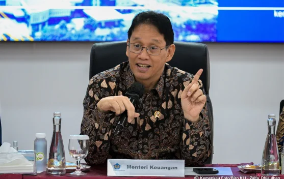 Grafik pergerakan rupiah terhadap dolar AS dan gedung Bank Indonesia