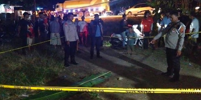 Ilustrasi garis polisi di lokasi penikaman di desa Aek Batu, Labuhanbatu Selatan