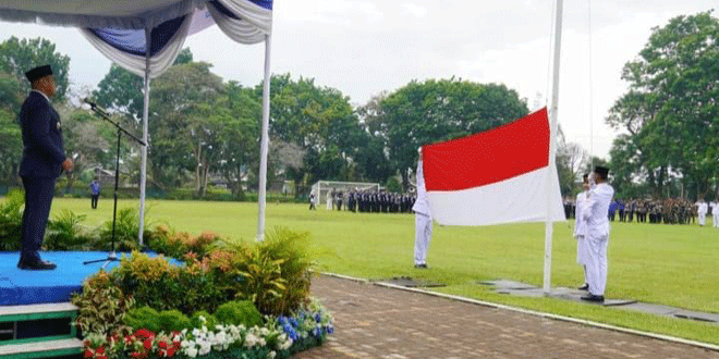 Upacara Hari Kebangkitan Nasional ke-118 di Lapangan Tanjunggading Batubara