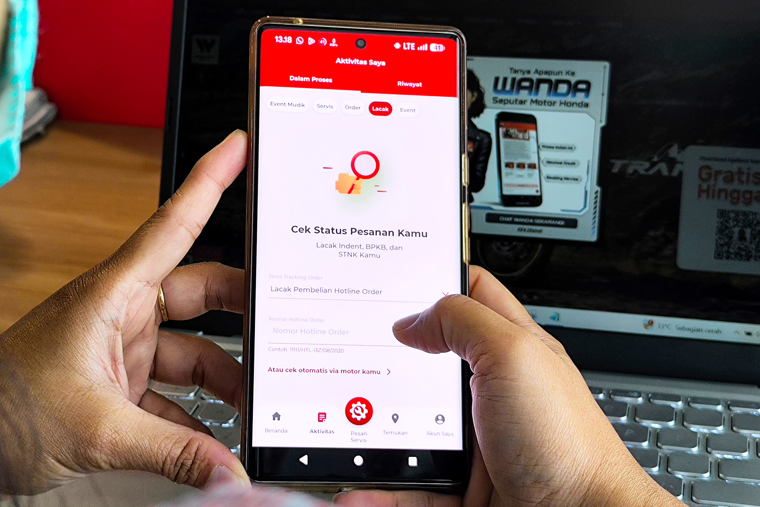 Antarmuka aplikasi WANDA menampilkan fitur pelacakan dokumen dan riwayat pembelian Honda
