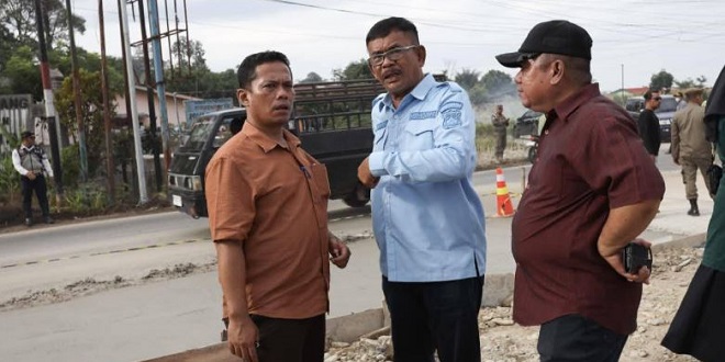 Pengaspalan Outer Ringroad ruas Simpang Parapat ke Saribudolok