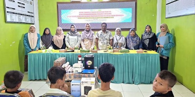 Tim PKM Unimed menggelar edukasi siaga bencana dan trauma healing untuk anak SD di Desa Paya Perupuk, Langkat