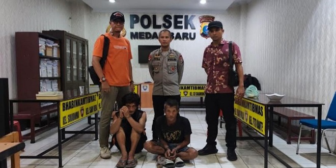 Personel Brimob mengamankan pelaku pencurian kabel di Jalan Gatot Subroto, Medan