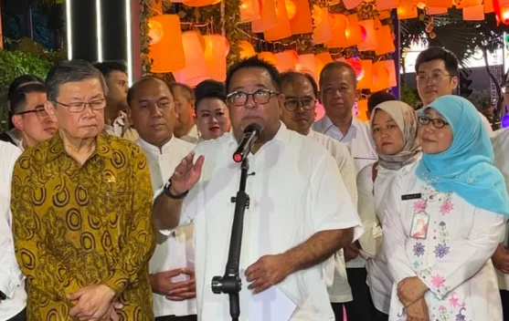 Ilustrasi perayaan 500 tahun Jakarta dengan ondel-ondel dan panggung kota