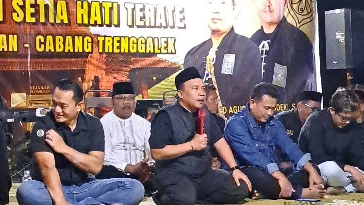 Ketua KONI Trenggalek memberi sambutan di tasyakuran PSHT Munjungan
