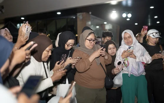 Suasana Festival Kuliner Banua dengan transaksi QRIS dan promosi wakaf digital