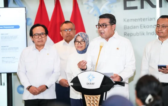 Ilustrasi kebijakan Rindekraf dan simbol ekonomi kreatif Indonesia