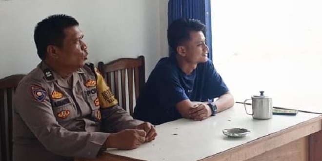 Bhabinkamtibmas memberi himbauan keamanan di kolam renang Water Song Siantar
