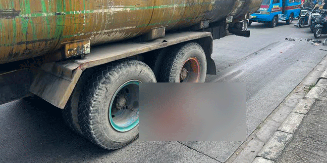 Lokasi kecelakaan ojol dilindas truk di Jalan Medan-Tanjung Morawa saat petugas mengamankan arus