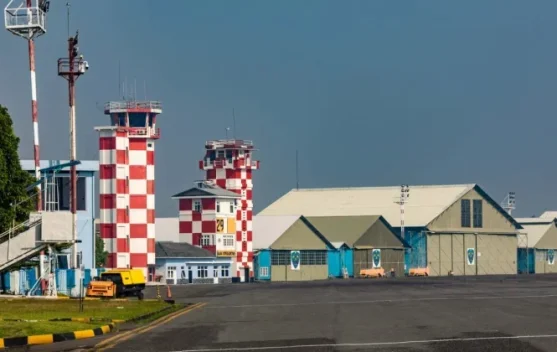 Bandara Husein Sastranegara dengan pesawat di apron, simbol konektivitas udara Bandung