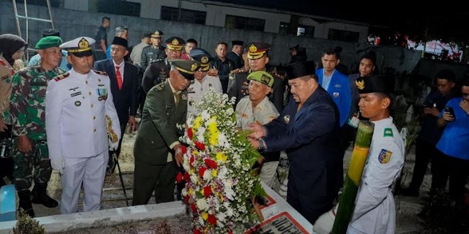 Upacara taptu dan ziarah kubur pejuang di Perkuburan Desa Simpang Dolok