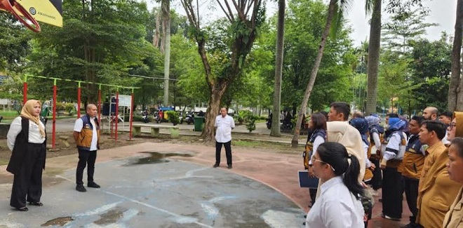 Petugas Bapenda dan perangkat kelurahan saat apel dan operasi PBB di Kelurahan Babura, Medan