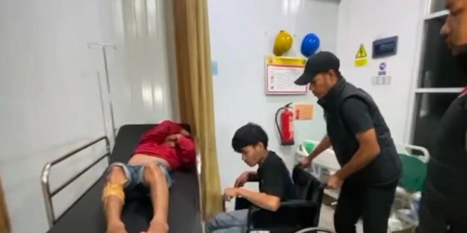 Petugas polisi saat penangkapan pelaku perampokan ojek online di Medan