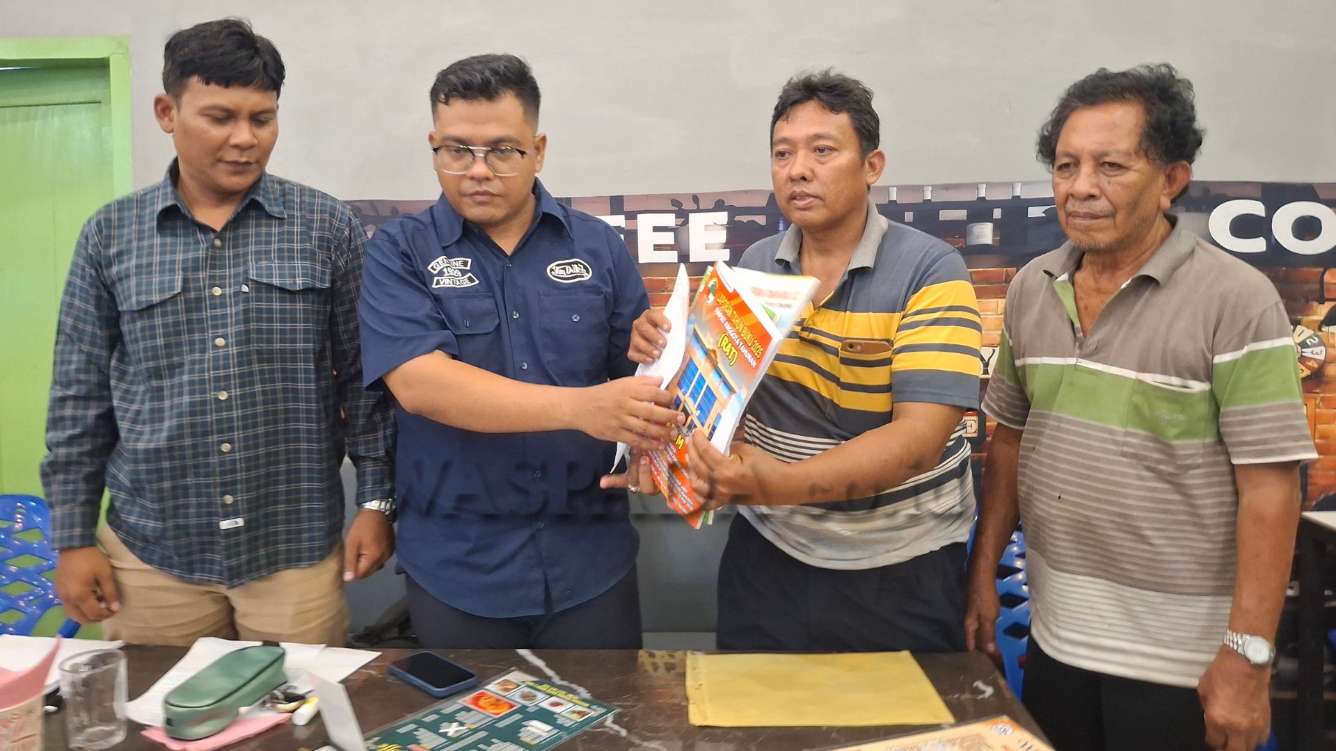 Rapat anggota koperasi dan dokumen laporan keuangan KPUM