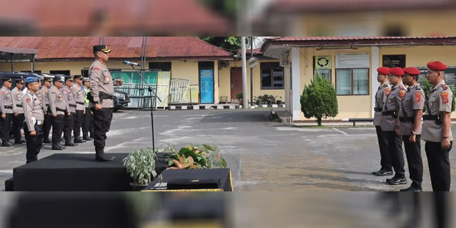 Kapolres memimpin serah terima jabatan di lapangan apel Mapolres Pematangsiantar