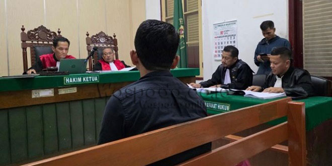 Fitri Agust saat persidangan Pengadilan Negeri Medan