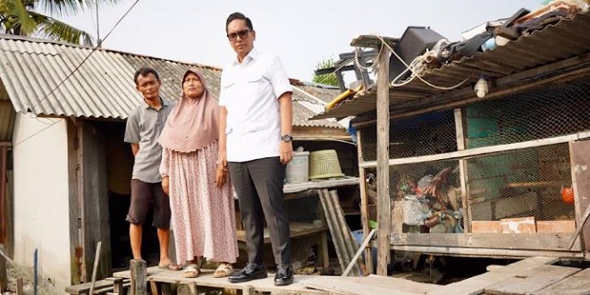 Rumah Cici Herliawati di Belawan yang hanya menyisakan dapur setelah bagian depan runtuh