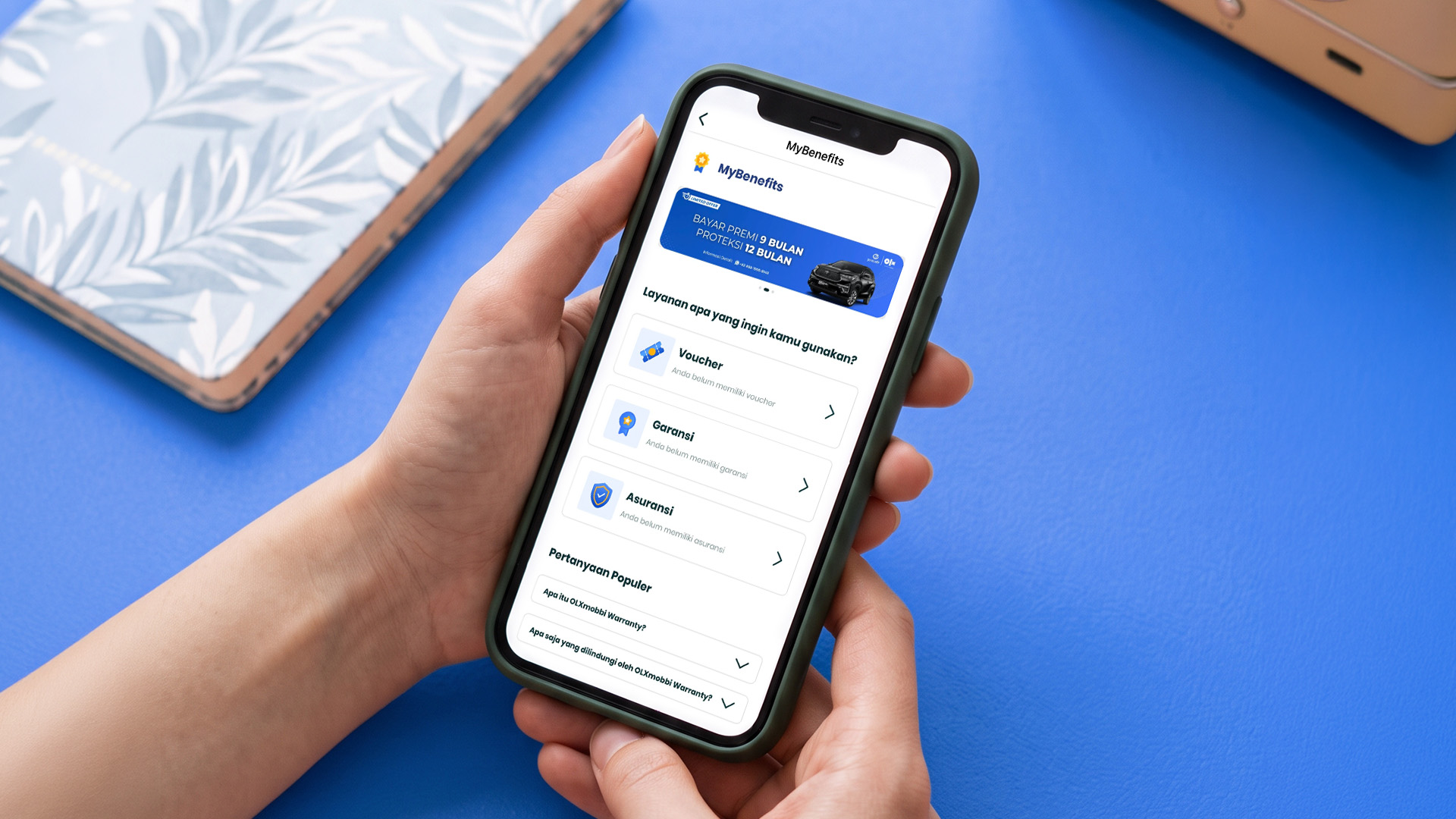 Ilustrasi fitur MyBenefits OLX dan OLXmobbi untuk pembeli mobil bekas dan perangkat elektronik